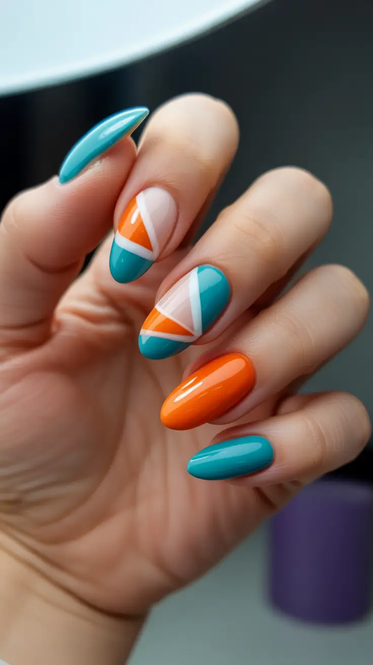 best colorful spring nails 2026 Geometric Color Blocking in Blue and Orange