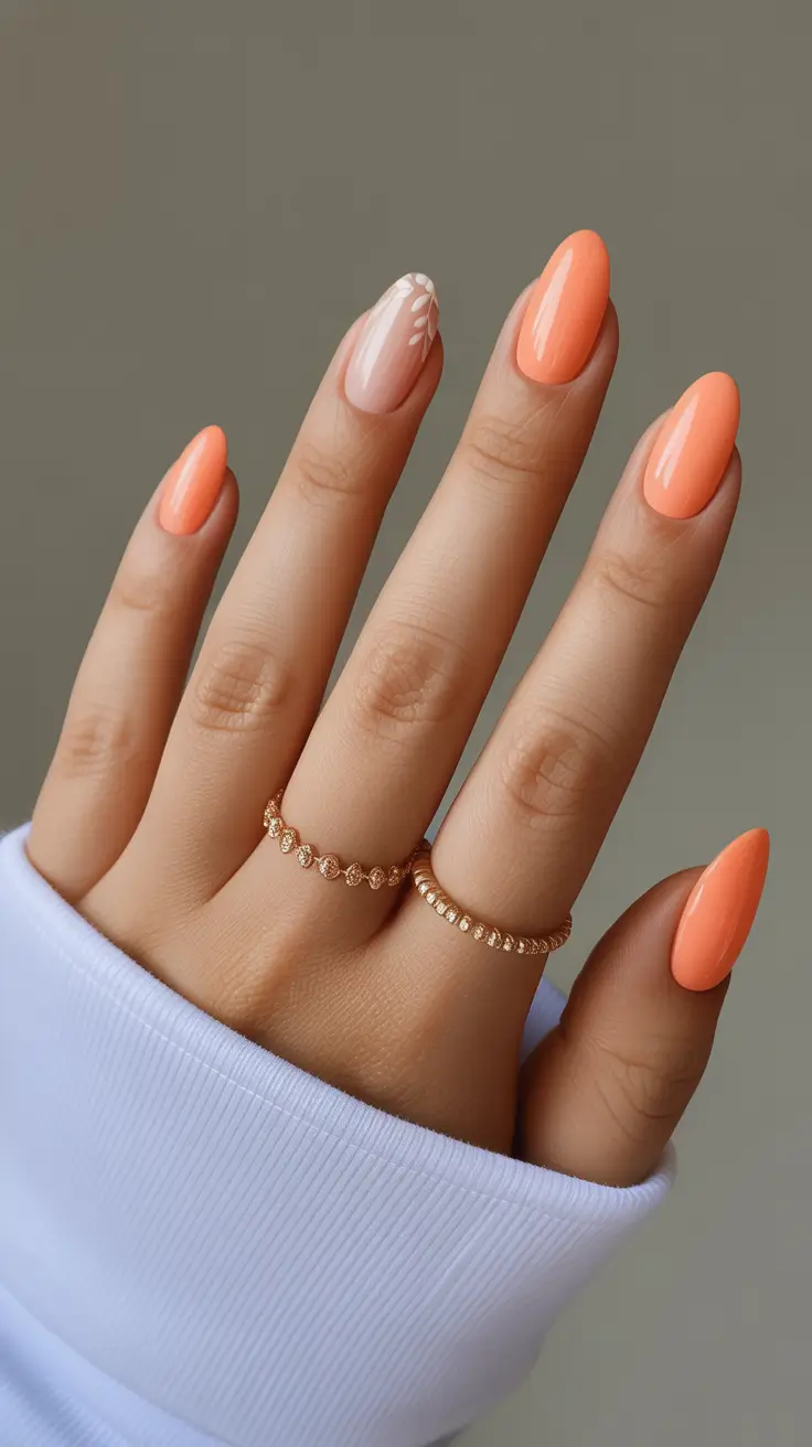 amazing spring almond nails 2026 Peach Almond Nails With Minimal Floral Detail