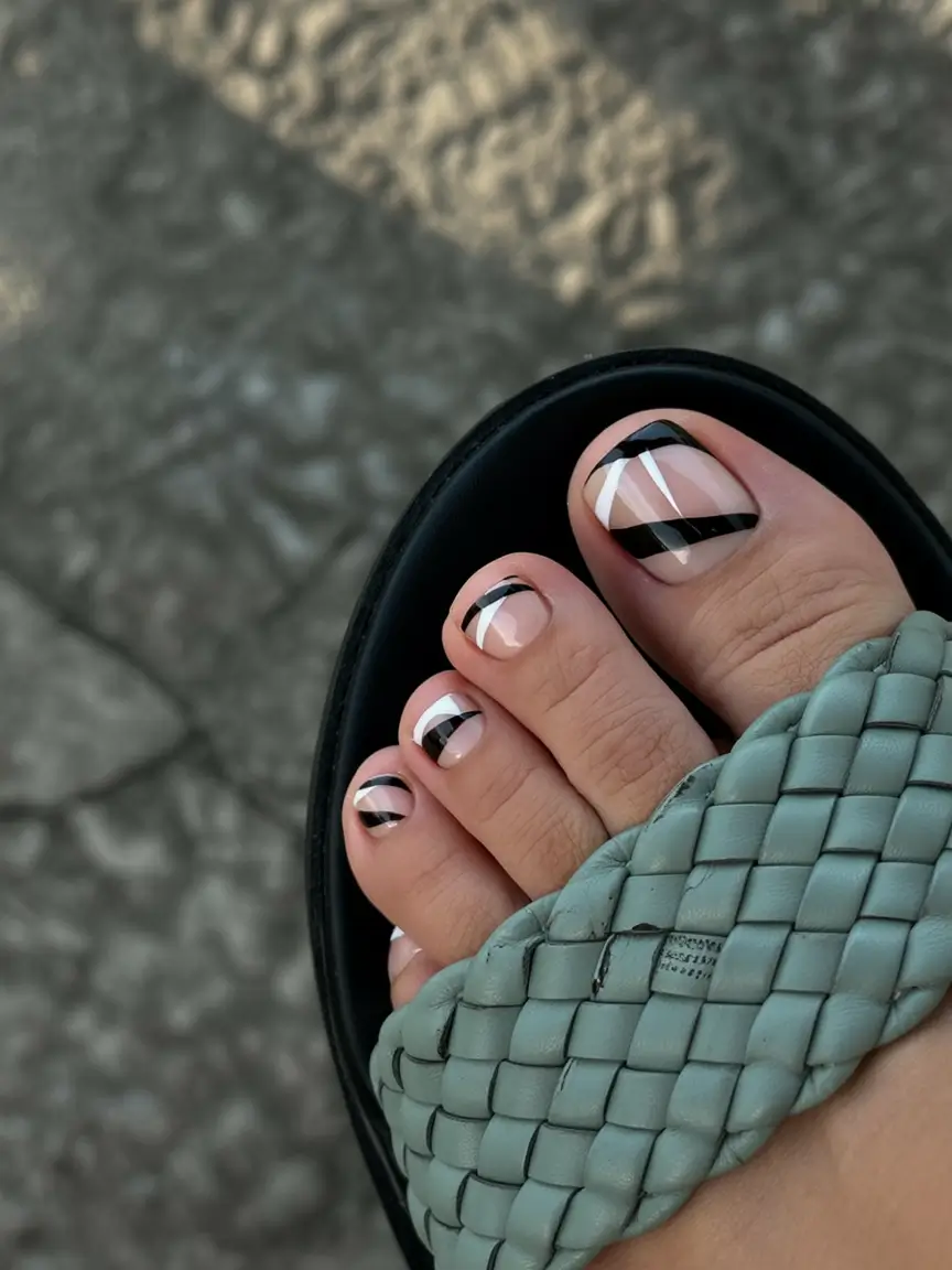 spring toe nail colors 2026 Graphic Black French Pedicure for Modern Minimal Style