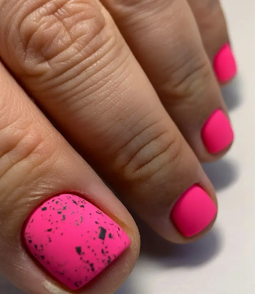 spring toe nails 2026 Neon Pink Speckled Pedicure