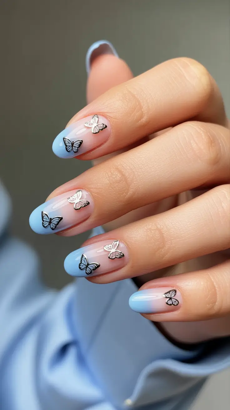 gorgeous spring wedding nails 2026 Dreamy Blue Butterfly Nails for a Playful Bridesmaid Look