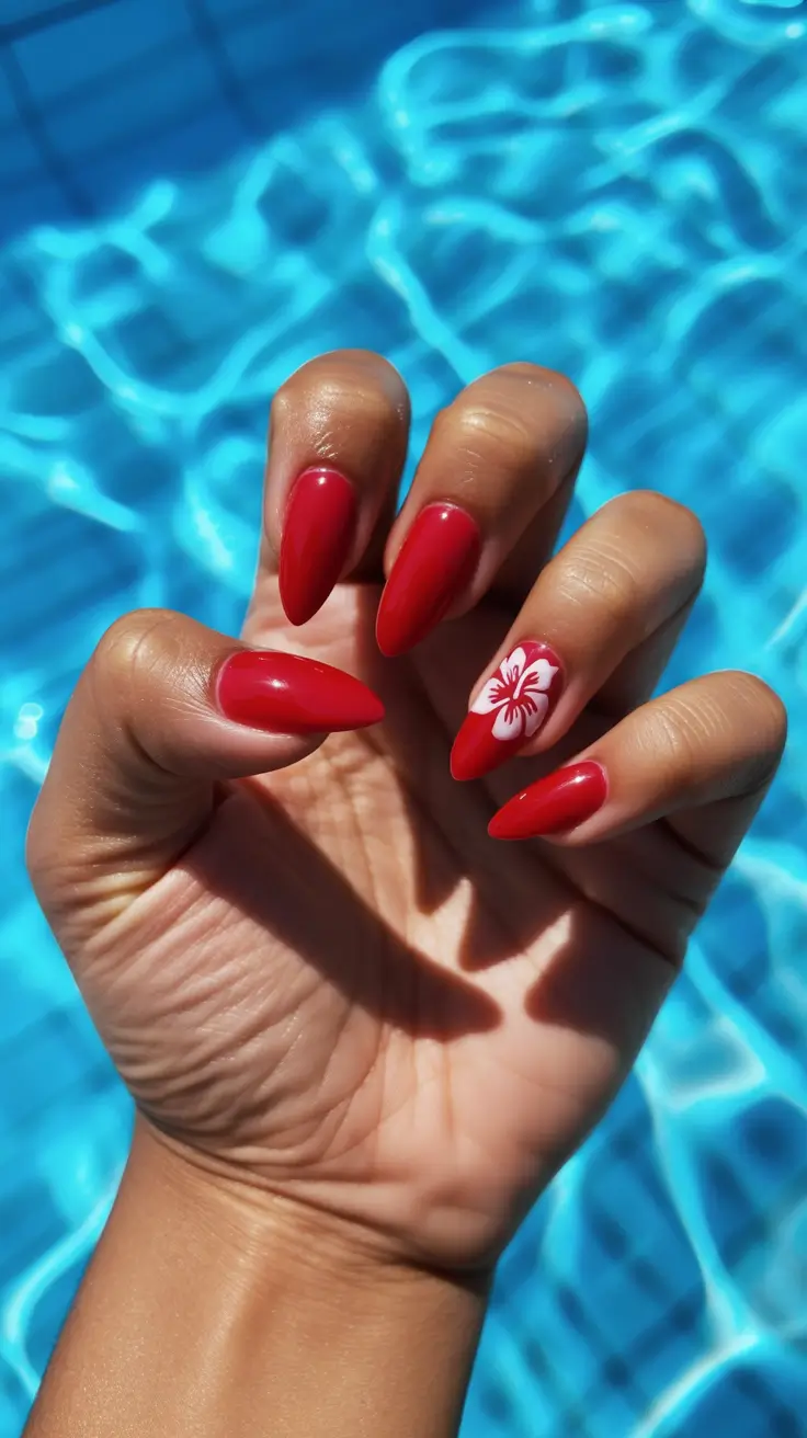 summer nail inspo almond shape Cherry Red Almond Nails with a Tropical Accent
