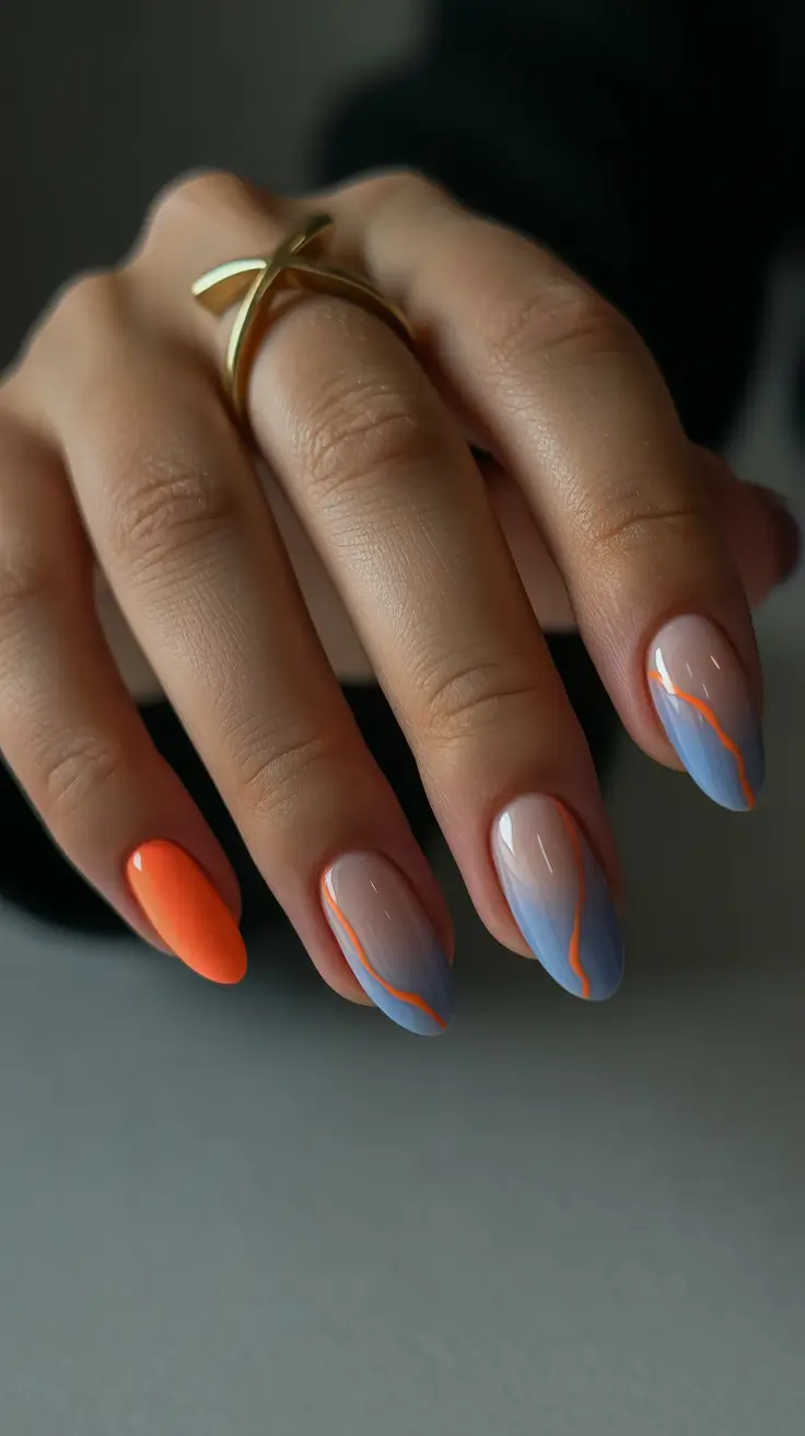 summer nail inspo almond shape Soft Blue and Orange Waves with a Modern Edge