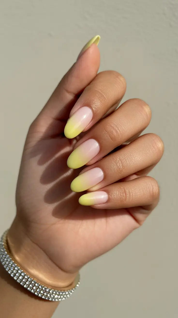 summer nail inspo almond shape Soft Yellow Ombre Almond Nails That Glow in the Sun