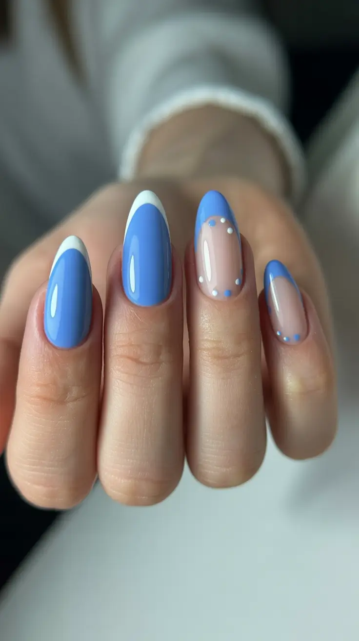 summer nail inspo almond shape Glossy Blue Almond Nails with Minimal Dot Accents