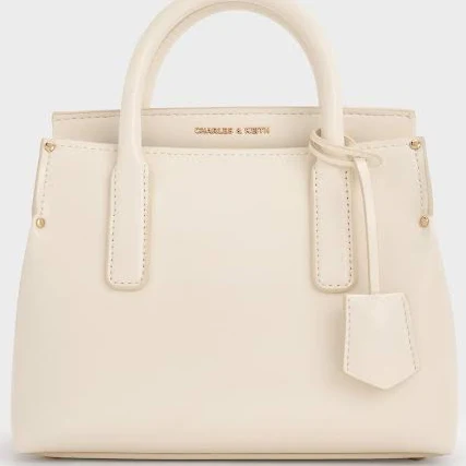 bag Charles & Keith Rene Structured Top Handle Bag charleskeith.com $103