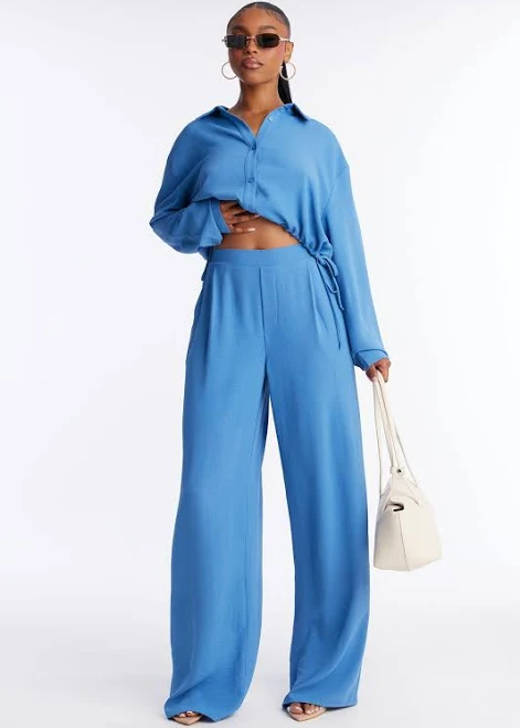 matching set Fashion Nova Long Sleeve Cropped Button Up Shirt and Wide Leg Pant Set Fashion Nova $19.99
