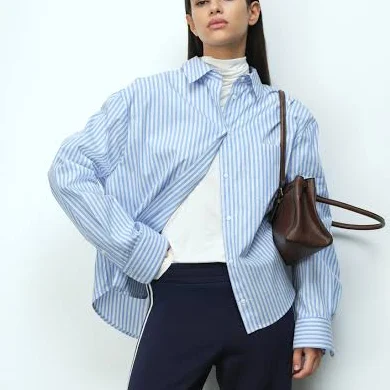 top H&M Ladies Oversized Poplin Shirt H&M $19.99