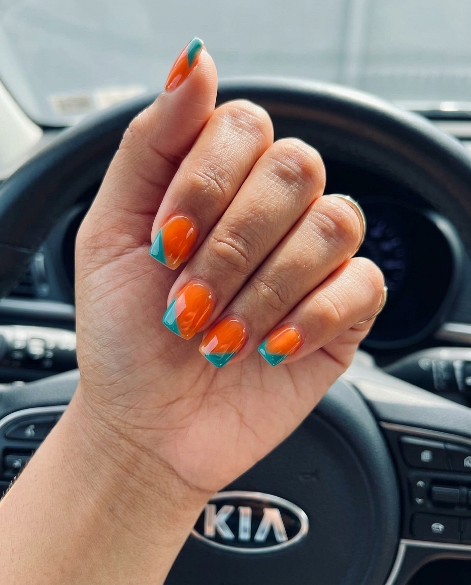 Orange Jelly Color Block Squares: Bold geometric nails with vibrant orange jelly & contrasting blocks. Summer fun!