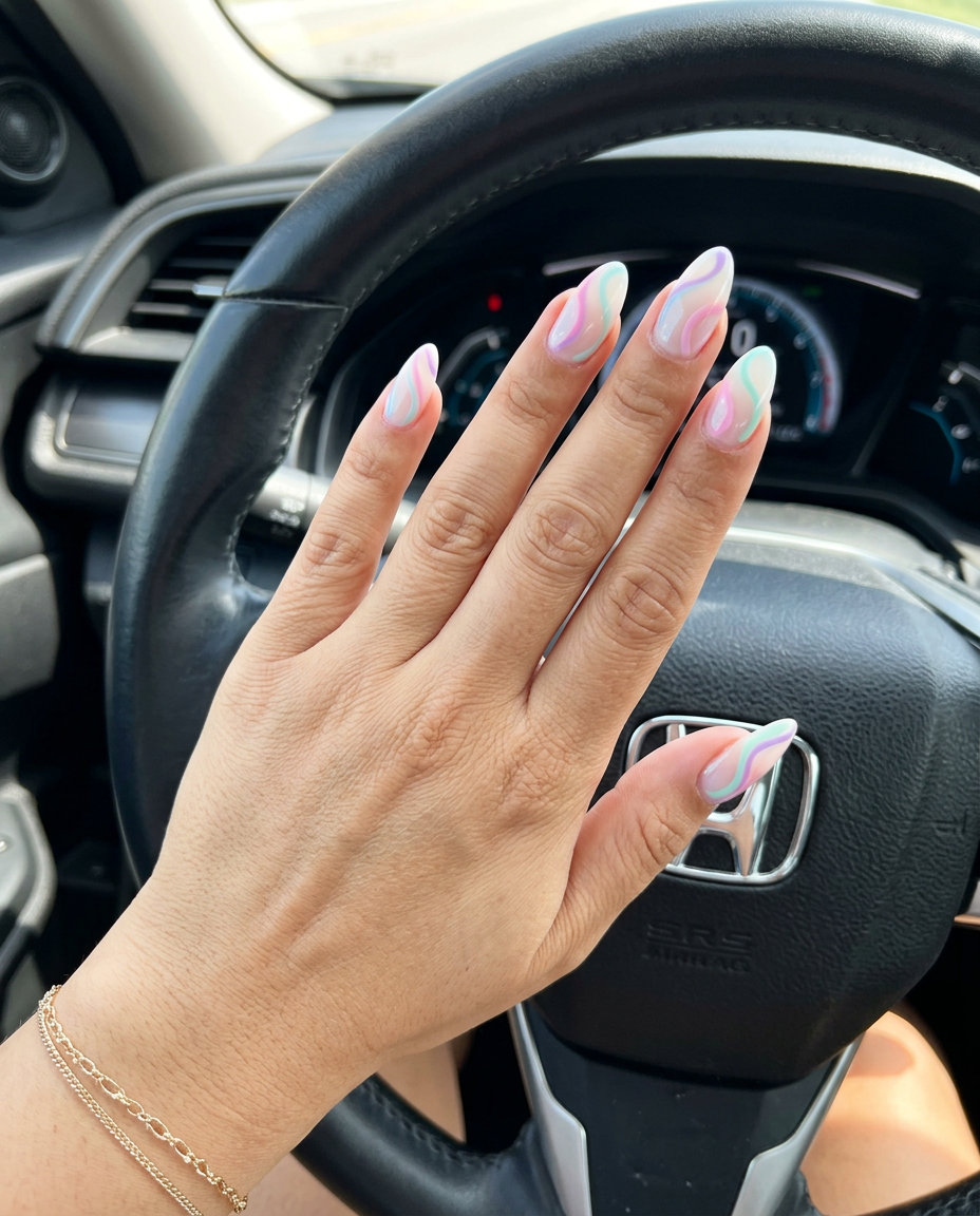Cute summer nails 2026: Watercolor Dream Almond Swirls in pastels. Romantic and artistic.
