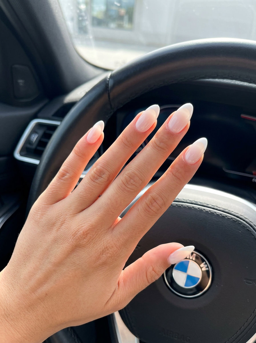 Elegant sheer milky white French tips on short nails for bridal summer 2026 events.