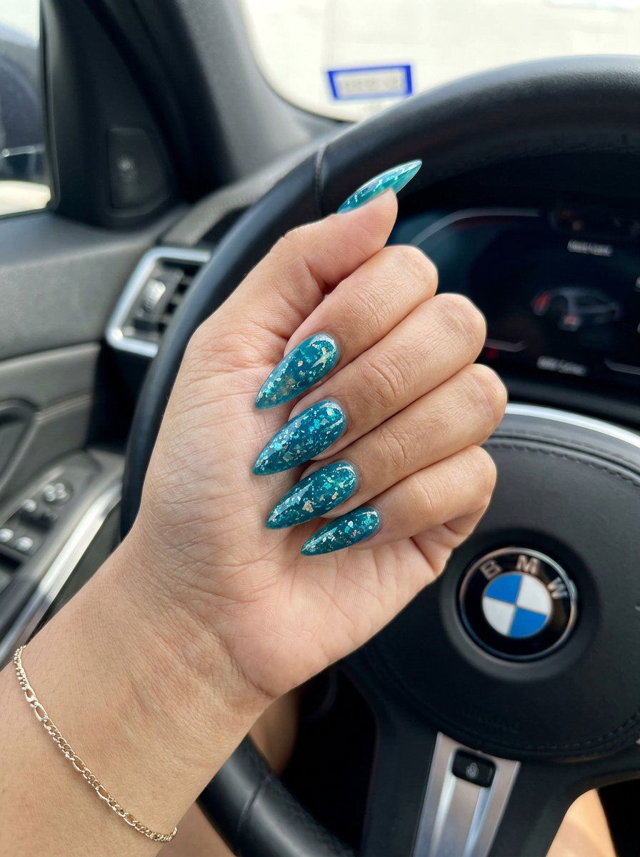 Ocean Jewel Jelly Foil nails: sultry teal jelly with iridescent flakes for summer vibes nails 2026.