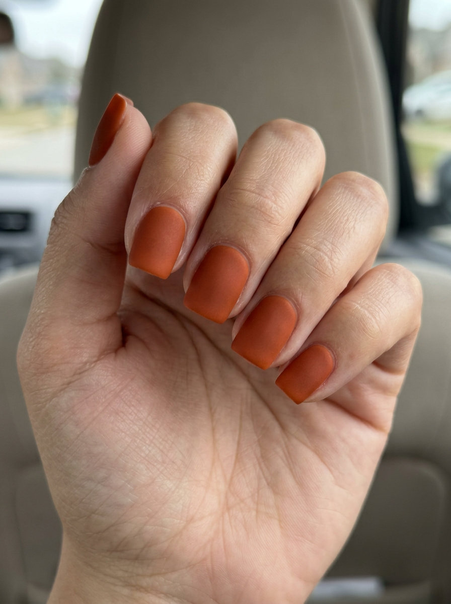 Terracotta Matte Chic nails: deep burnt orange with a velvet matte finish for sophisticated daily wear. Orange summer nails 2026.