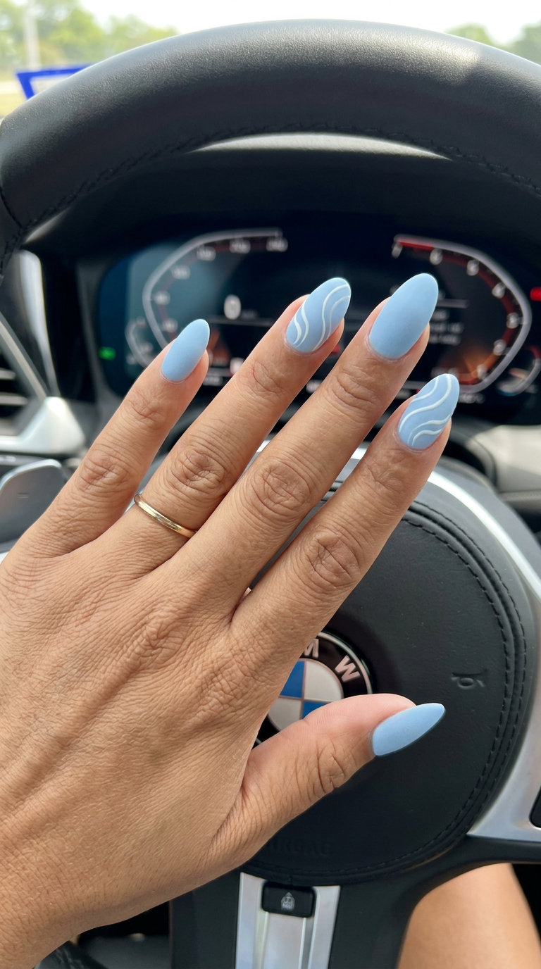 Sky Blue Velvet Swirls nails for oval summer nails 2026. Artistic casual & festival wear.