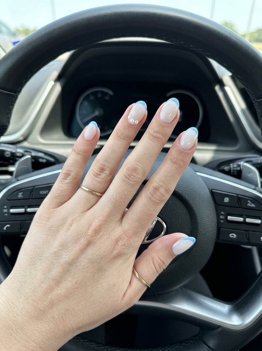 Sky Blue Micro French with Pearl Accents: clean-girl summer acrylic nail designs 2026 for work and brunch.