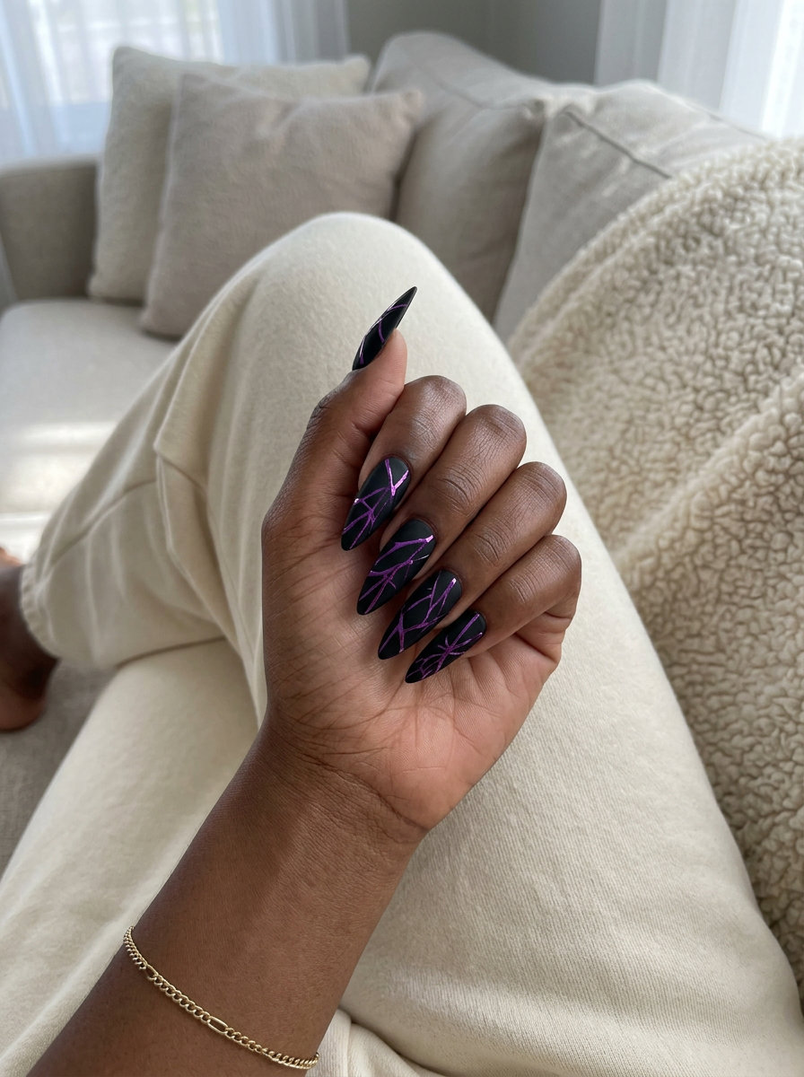 Amethyst chrome shattered lines on matte black nails for summer colorful nails designs 2026. Futuristic party look.