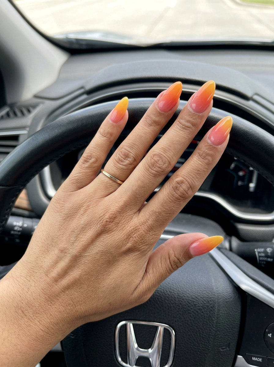 Golden Hour Ombre Almond nails: marigold yellow, orange, rosy pink gradient for vacation summer colorful nails designs 2026.