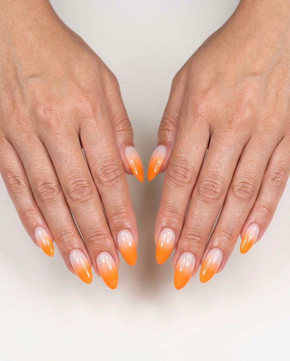 Citrus slice ombre nails in orange and white, a playful summer nail manicure idea 2026.