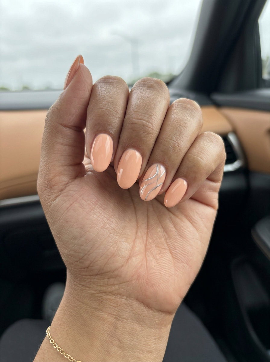 Soft Peach & Silver Line Accent nails for summer nail manicure ideas 2026. Sophisticated office style.