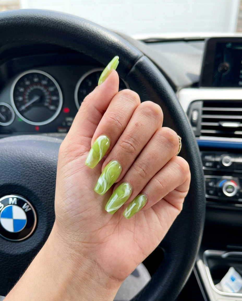 Juicy Marble Swirl Coffin nails: translucent lime green jelly with opaque white marble for summer nails 2026.