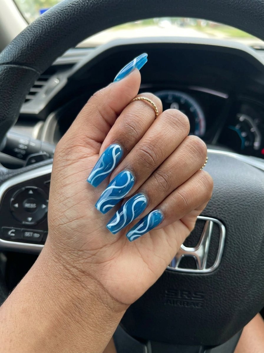 Emerald Jelly Stiletto Swirls: Bold summer nails for dark skin 2026, great for festivals.