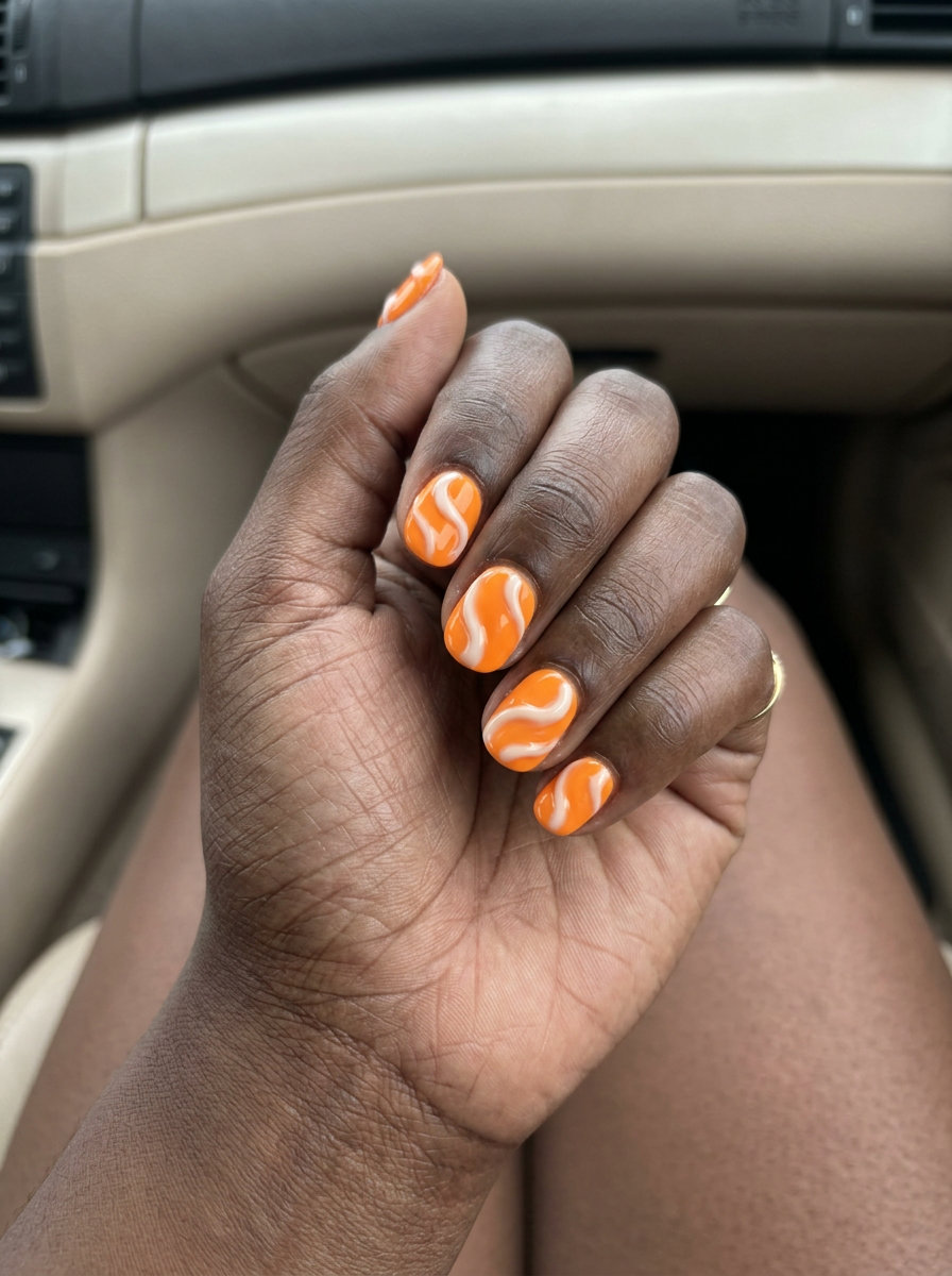Citrus Swirl Texture nails for summer 2026, playful and artistic for casual outings and brunch.