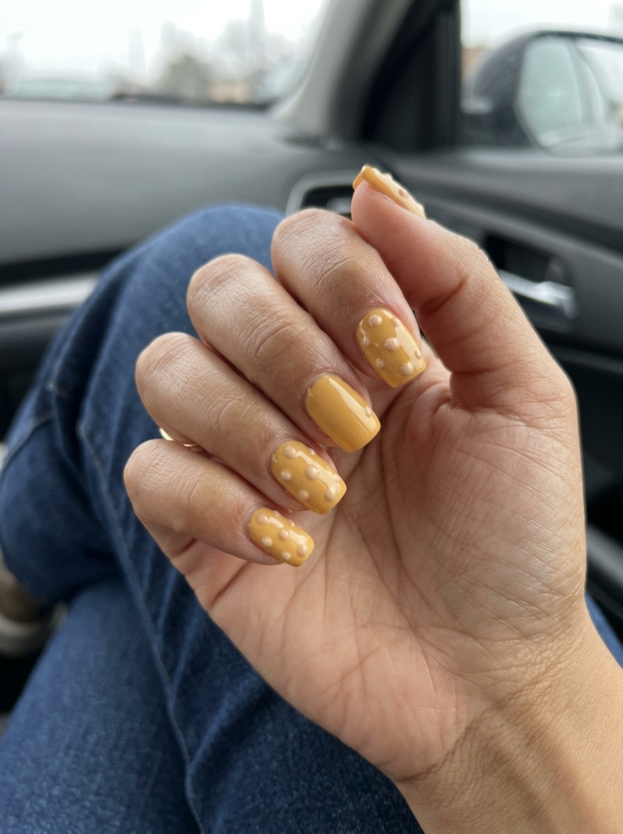 Textured butterscotch dot square nails for playful summer 2026 casual outings.