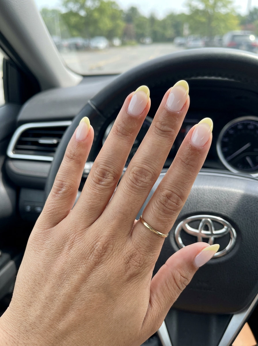 Mellow yellow milky French tip oval nails for clean girl summer vibes nails 2026 daily wear.