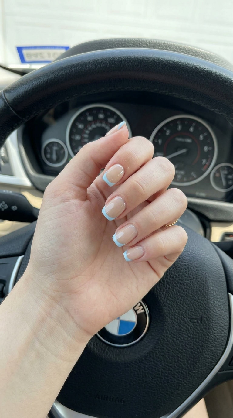 Trending Summer Nails 2026: Pale Blue Micro French Trending summer nails 2026: Chic pale blue micro French tips on nude base for daily wear and bridal showers.